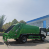 HOWO 7cbm Rhd Waste Refuse Collection Garbage Compactor Truck with Guard Cover